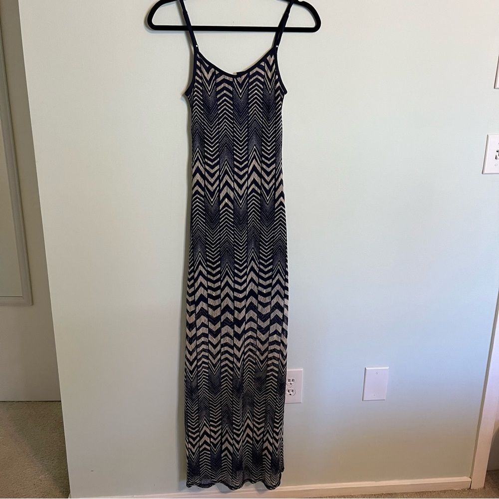 Fire Maxi dress. Cream and navy pattern. Adjustable straps. 2 side parts. Small